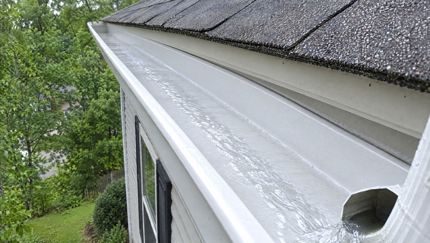 Rain gutter along a roofline — after
